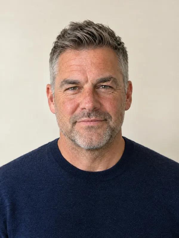 The same man with the same style in his own salt-and-pepper color, blended at the hairline