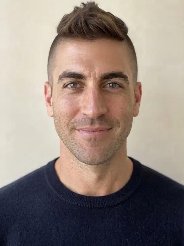 The same man with a mohawk