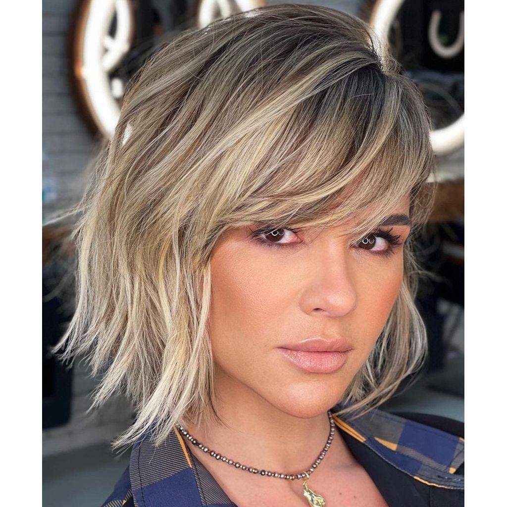 Textured Bob with Side-Swept Bangs hairstyle