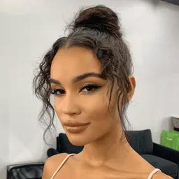 Textured Bun with Face Framing Waves